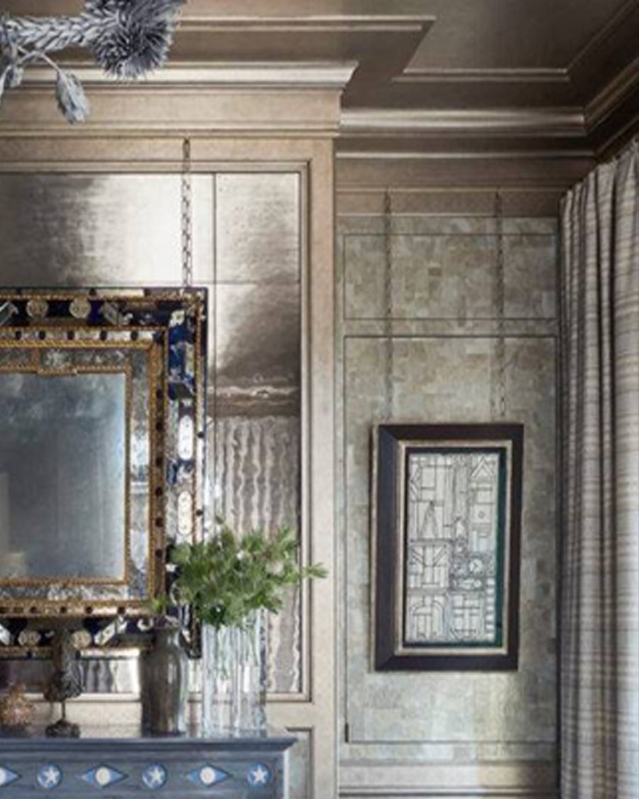 A mica-clad bar room at 740 Park with a Venetian mirror and shimmering silver-grey walls
